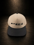 Beige and black cap with 'SPEC'D MOTORSPORTS' logo on a dark background